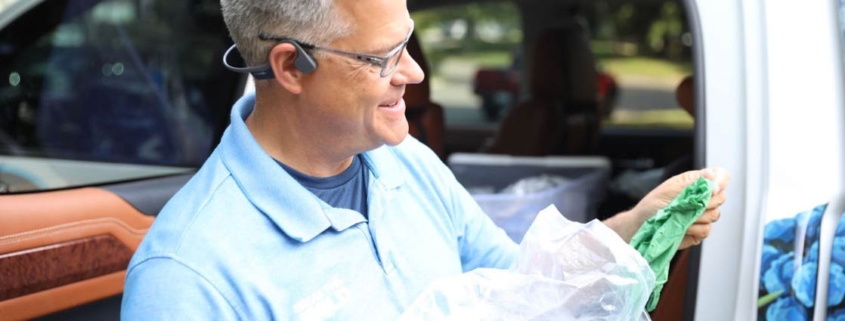 The owner of Break The Mold taking a call about a mold inspection.